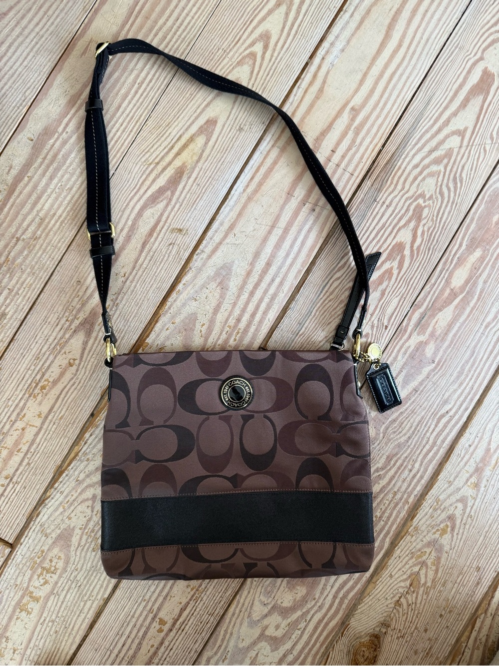 Coach signature brown and black crossbody bag with leather trim